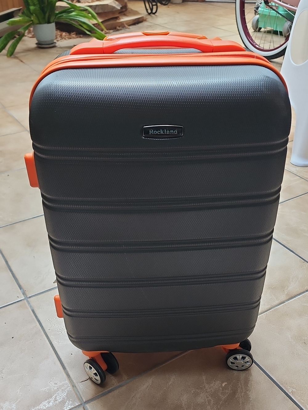 Rockland Hardshell Carry-On Luggage in Charcoal with Orange Trim